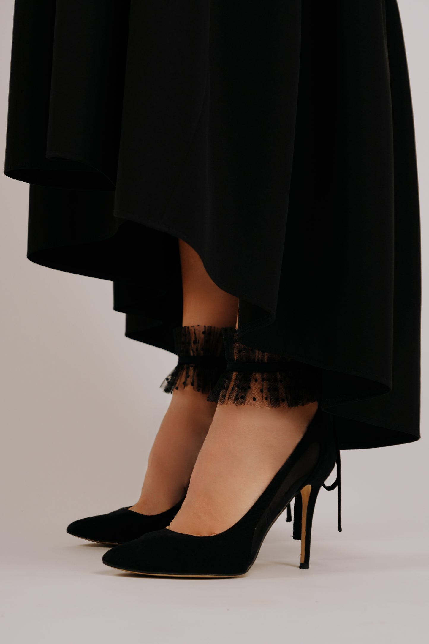 Melnas kājas aproces