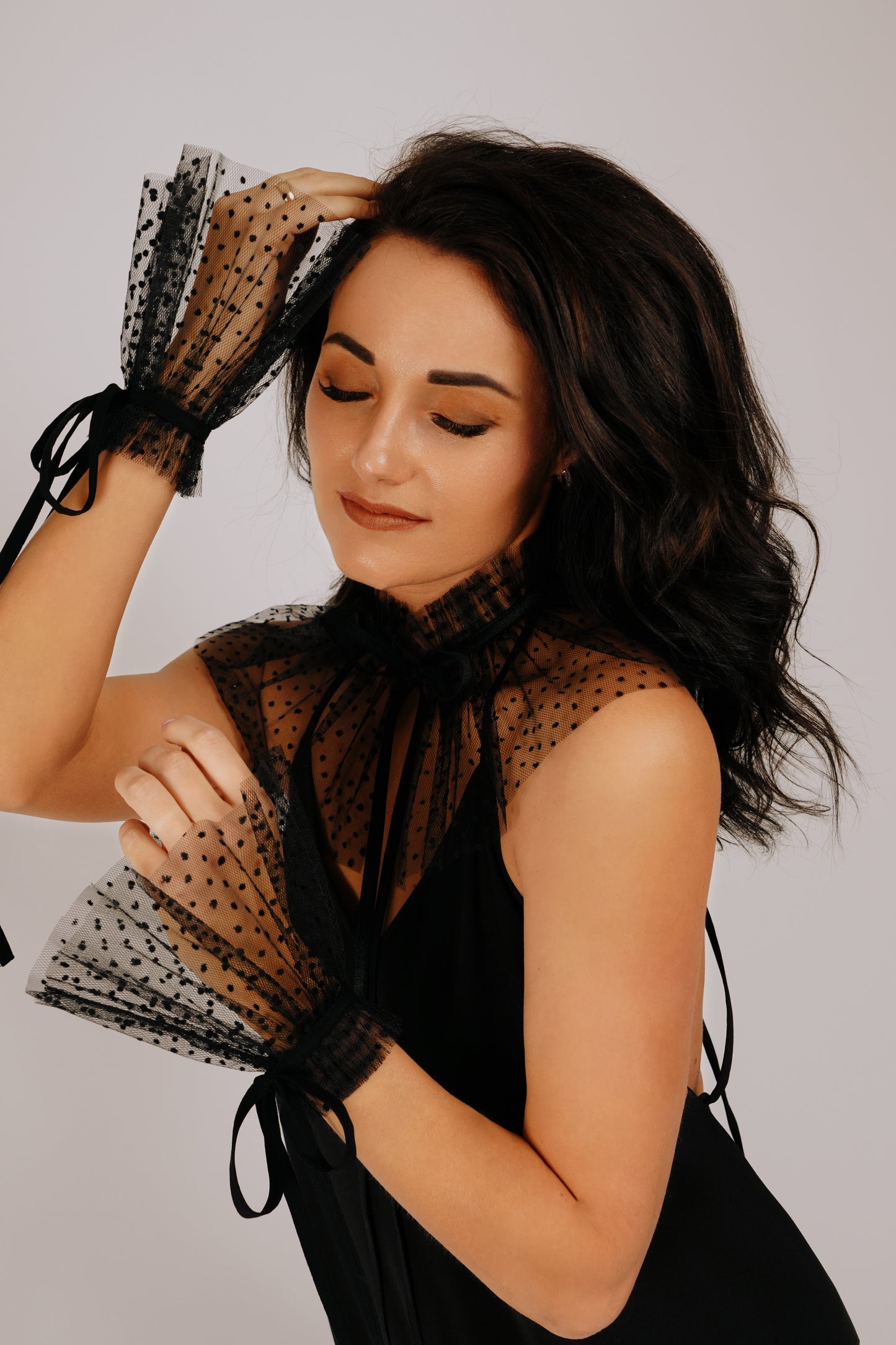 Melns pumpiņtillas žabo ar sienamu lentu