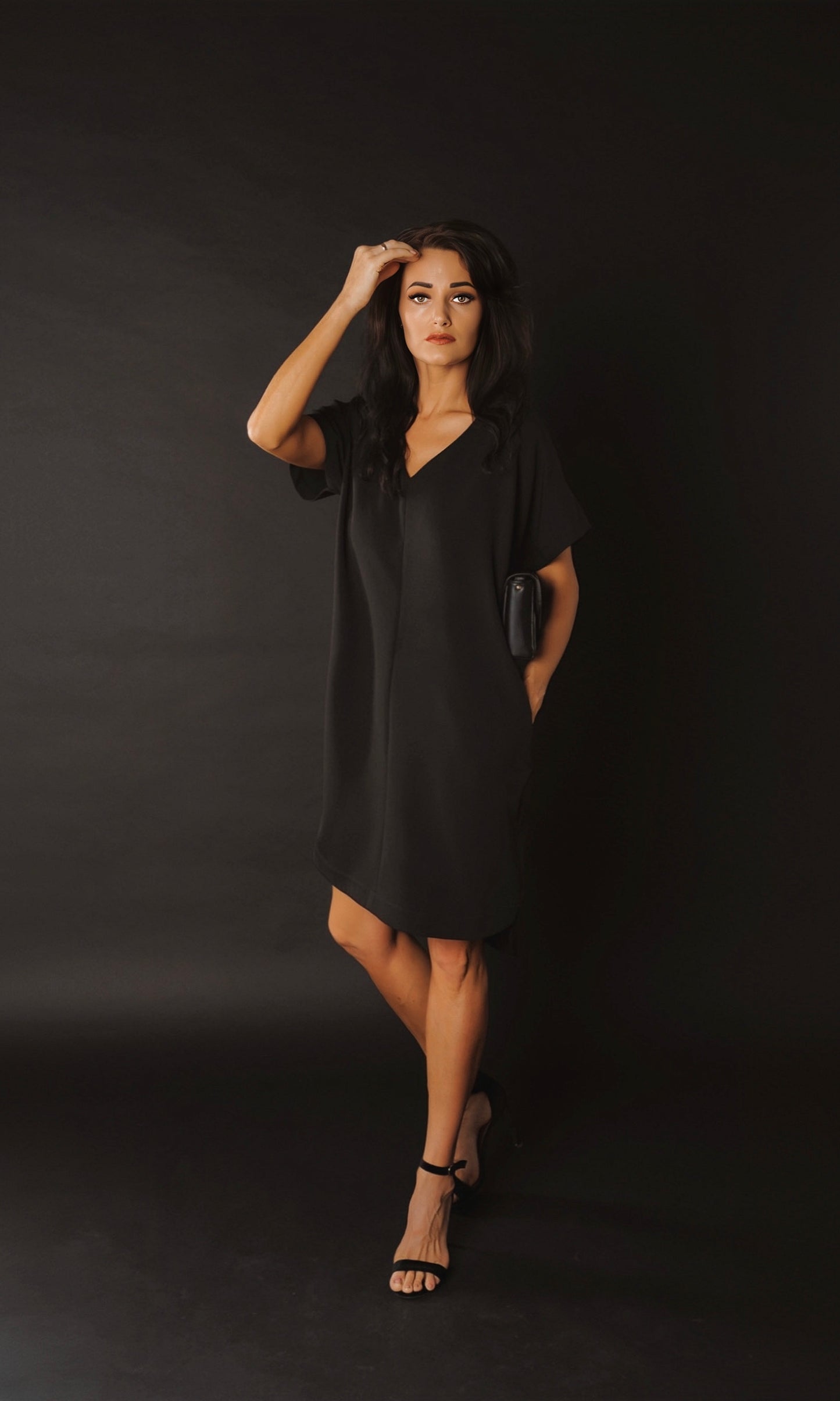 Oversize midi kleita ar sānu kabatām